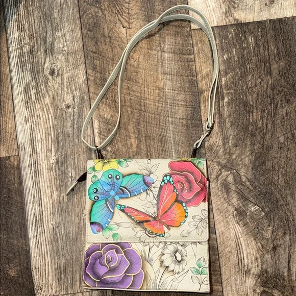 Anuschka Cream Crossbody Bag with Multicolor Butterfly & Floral Artwork - Picture 1 of 7